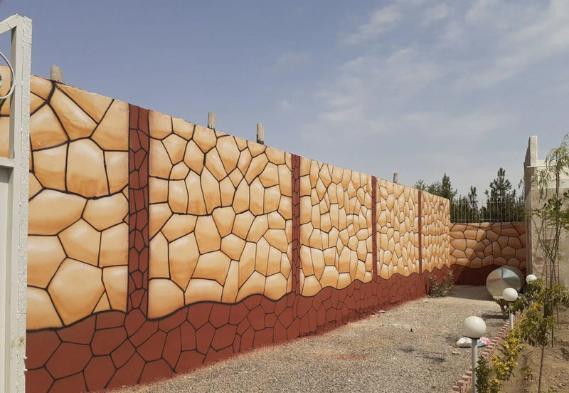 نقاشی طرح سنگ روی دیوار سیمانی - 2